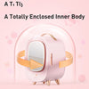 Pink and gold device with a mirror on a pink background